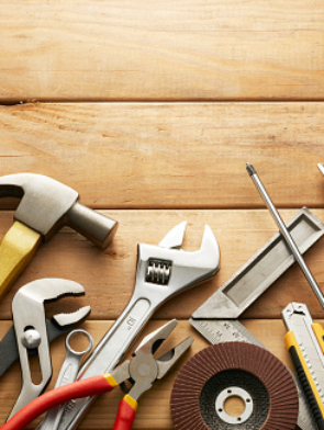 variety of tools on wood planks with copy space